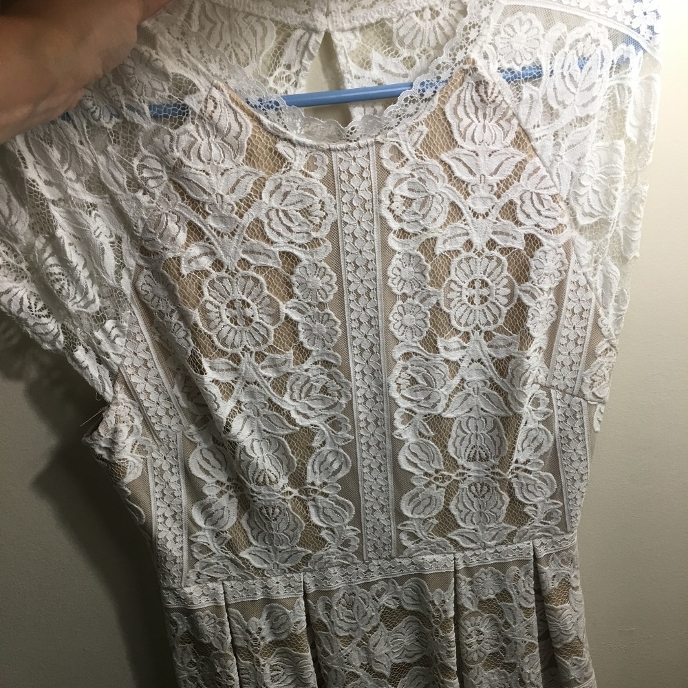 Francesa's white lace dress